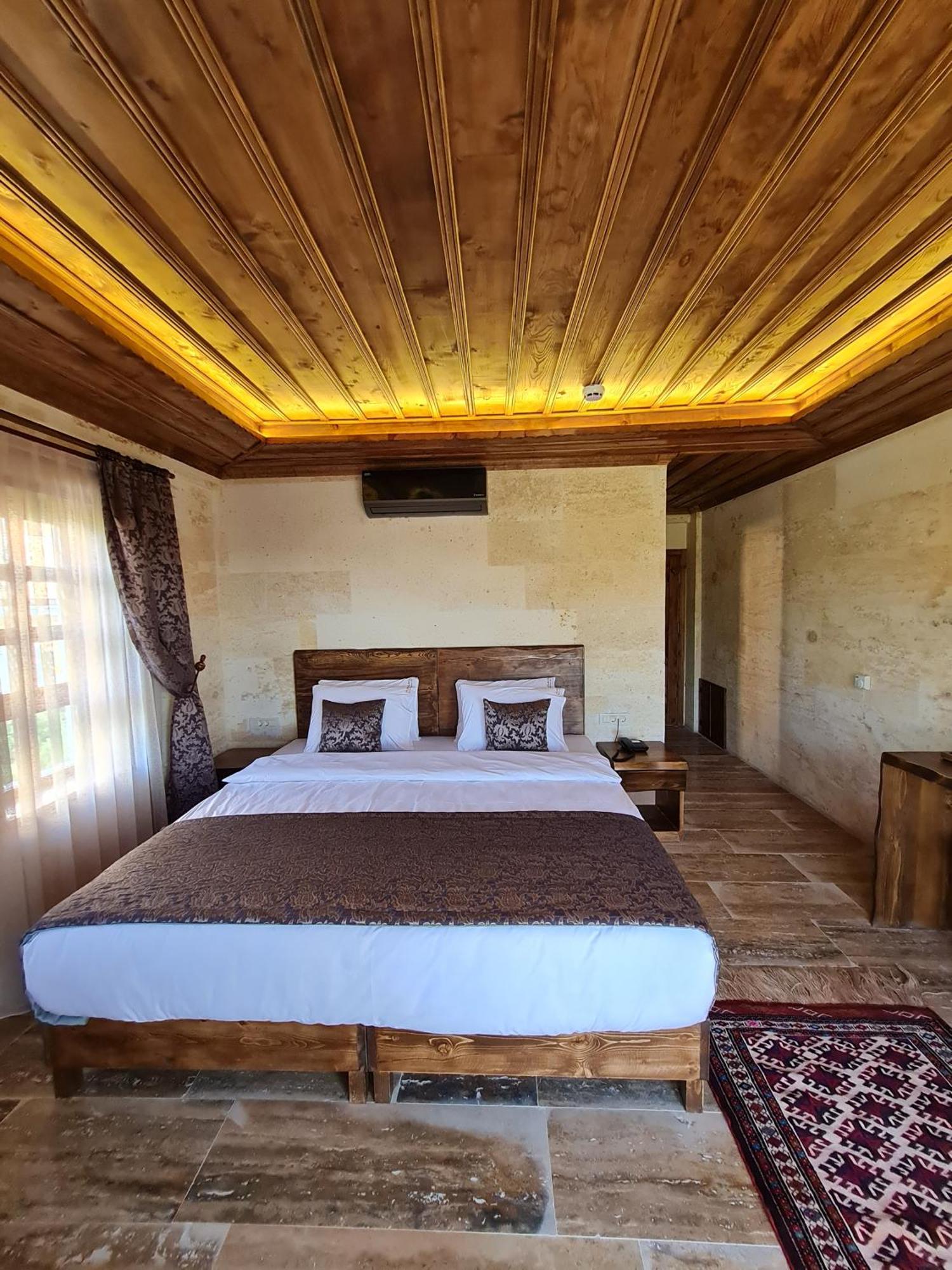 Flavia Cappadocia Hotel Üchisar Bagian luar foto